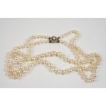 A TWO ROW GRADUATED CULTURED PEARL NECKLACE the pearls graduate from approximately 4.5mm. to 8.4mm.,