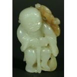 A CHINESE JADE FIGURE OF AN IMMORTAL, standing holding a staff, two bats to his back, 5cm