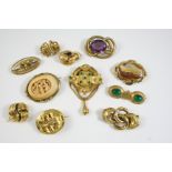 A QUANTITY OF JEWELLERY including a Victorian gold brooch set with a cabochon garnet, a 19th century