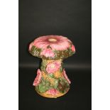 ZSOLNAY GARDEN SEAT a mushroom shaped garden seat, with a floral design in pink and green. Impressed