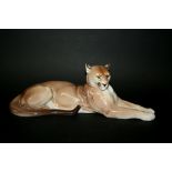 NYMPHENBURG MOUNTAIN LION a large model of a seated Mountain Lion. Impressed mark and numbers 560,