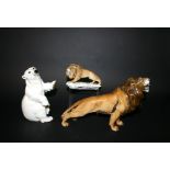 HUTSCHENREUTHER POLAR BEAR a porcelain model of a Polar Bear, also with two models of Lions by
