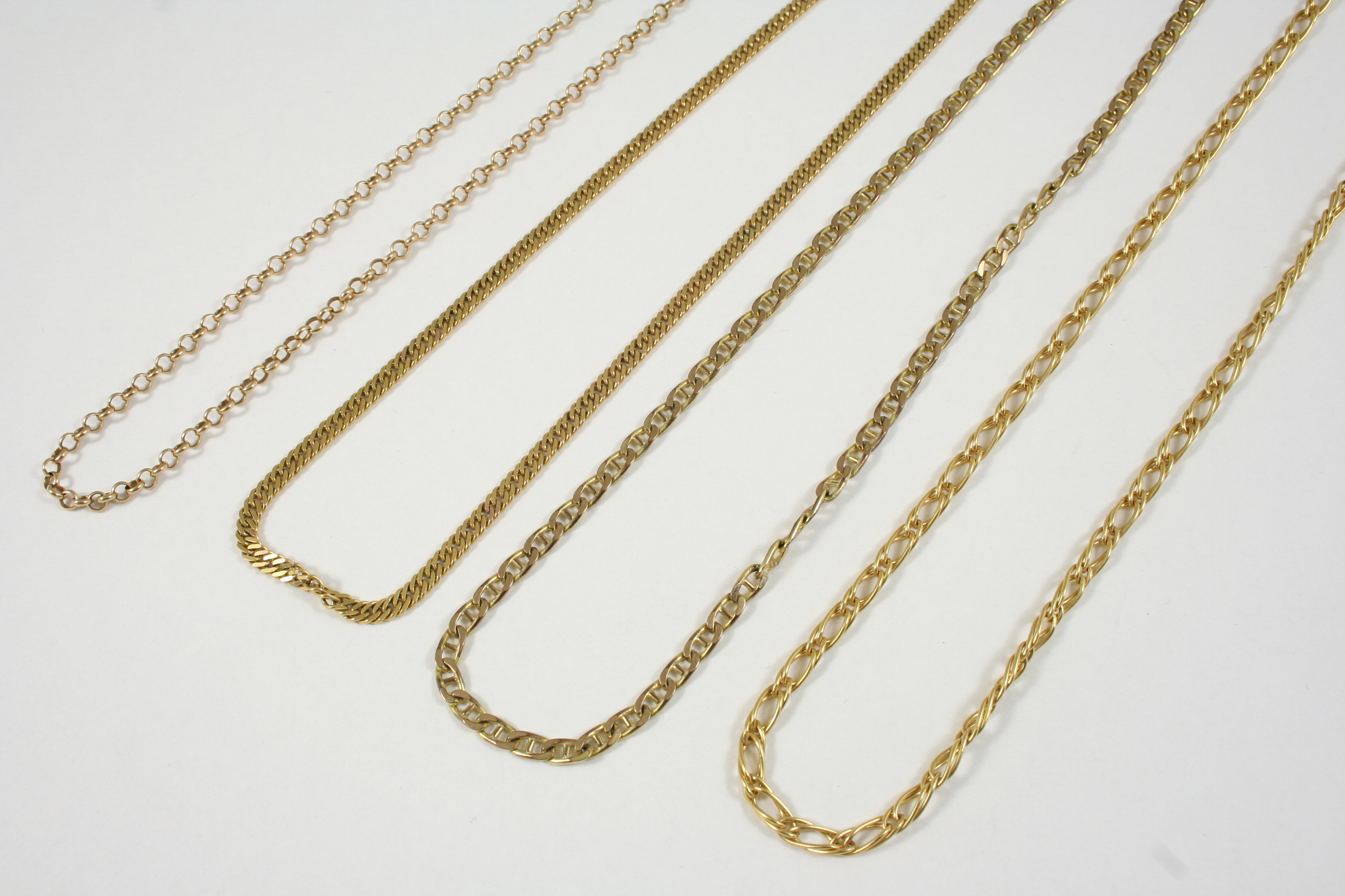 A 9CT. GOLD FANCY LINK NECKLACE 135cm. long, together with three other 9ct. gold necklaces, total