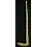 A CHINESE IVORY PARASOL HANDLE, late 19th/early 20th century, carved with a dragon head with