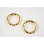 A PAIR OF 18CT. GOLD HOOP EARRINGS BY CARTIER with sliding action fitting, signed Cartier and