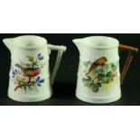 A ROYAL WORCESTER JUG, signed Powell, date cipher for 1941, painted with a Robin; and another,