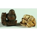 A JAPANESE IVORY NETSUKE, modelled as bowl resting his head on a cricket box, 3.5cm; together