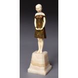 D.H.CHIPARUS - ART DECO BRONZE & IVORY FIGURE a bronze and ivory figure Innocence, the figure