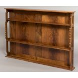 COTSWOLD SCHOOL WALL SHELVES - OLIVER MOREL a set of walnut wall shelves dated 1974, the 3 shelves