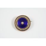 A VICTORIAN ENAMEL AND PEARL BROOCH the circular central section of blue guilloche enamel centred