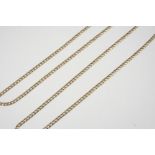 A 9CT. GOLD FLAT CURB LINK NECKLACE 75cm. long, 9.3 grams, together with another 9ct. gold flat curb