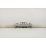 A DIAMOND FULL CIRCLE ETERNITY RING millegrain set with eight-cut diamonds. Size O 1/2.