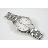 A GENTLEMAN'S STAINLESS STEEL WRISTWATCH BY GROVANA OF SWITZERLAND the signed dial with two Roman