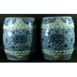 A PAIR OF CHINESE BLUE AND WHITE GARDEN SEATS possibly 19th Century. Barrel form, painted