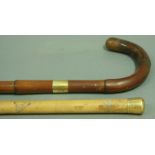 A BRIG OF LONDON 18CT GOLD MOUNTED BAMBOO WALKING STICK with Raglan crest, Sheffield 1899.