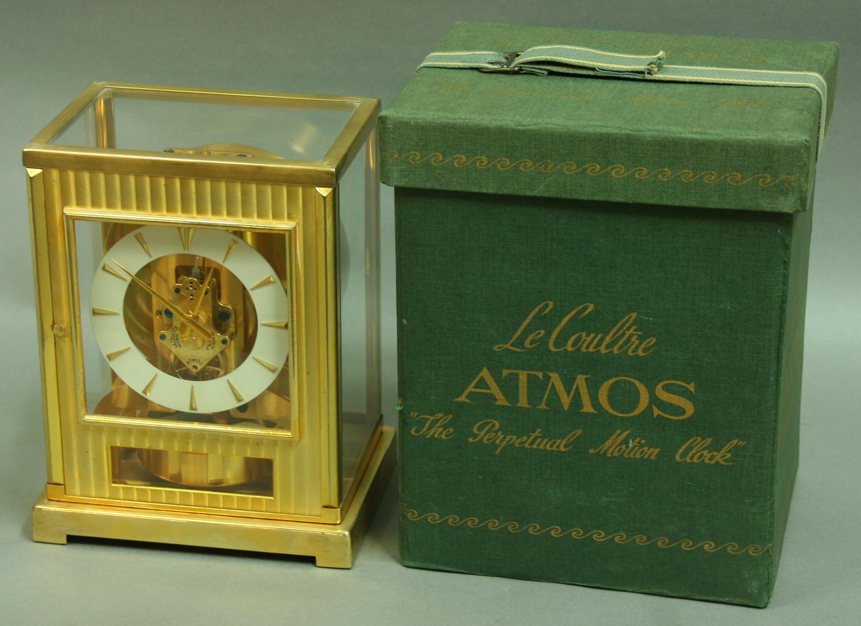 A JAEGER-LE-COULTRE ATMOS CLOCK, 1950's, movement number 60837, with white dial, textured gilt front