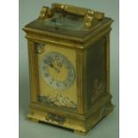 A FRENCH BRASS CARRIAGE CLOCK, in the Japanese Aesthetic taste, the gilt dial with silvered