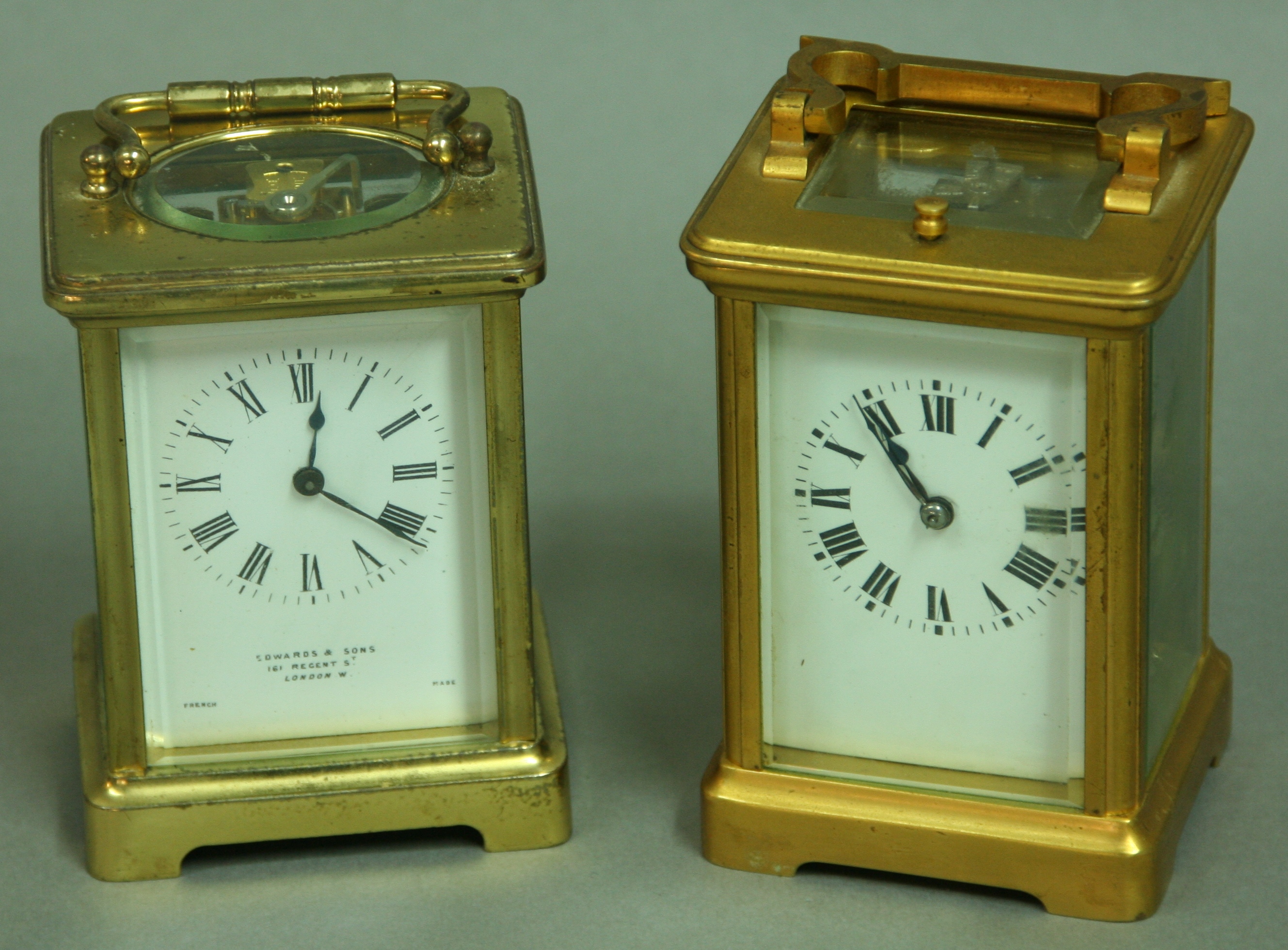 A FRENCH GILT BRASS CARRIAGE CLOCK with repeater movement striking to a gong, height excluding