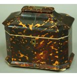A REGENCY TORTOISESHELL TEA CADDY, early 19th century, of canted rectangular form with two lidded
