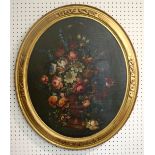 FOLLOWER OF ANDREA SCACCIATI (1644-1710) AN URN OF MIXED FLOWERS Oil on canvas, oval, 19th century