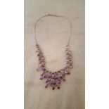 An amethyst and silver necklace