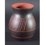 ROSSO ANTIQUO STYLE VASE, of squat baluster form, with wavy sgraffito black through to terracotta