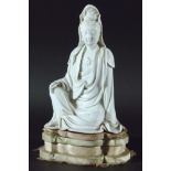 CHINESE DEHUA FIGURE OF GUANYIN, probably 18th century, four character signature to reverse,