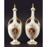 PAIR OF ROYAL WORCESTER VASES AND COVERS, date code for 1922, signed W Bee, shape 2700, painted with
