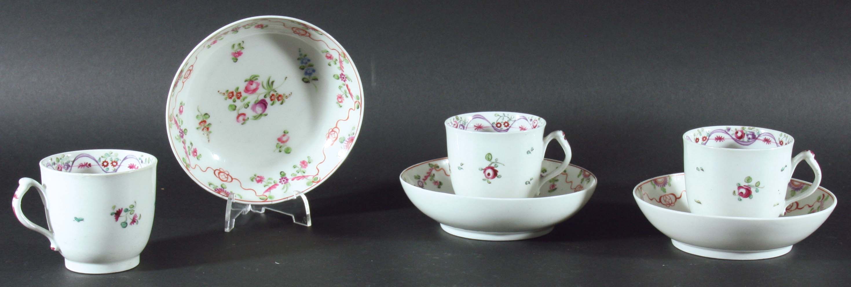 SET OF EIGHT NEW HALL STYLE COFFEE CUPS, late 18th century, with floral and ribbon borders; together