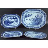 FOUR CHINESE EXPORT BLUE AND WHITE PLATTERS, late 18th century and later, painted with various