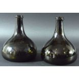 TWO ONION WINE BOTTLES, green glass with kick up concave base, 20cm (2)