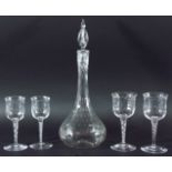 SUITE OF DRINKING GLASSES, 20th century, the bowl with air inclusions above an air twist stem and