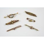 SIX ASSORTED GOLD AND GEM SET BROOCHES