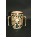 DOULTON LAMBETH TYG the 3 handled tyg designed with flowers and leaves on a green ground, and