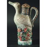 CHINESE EXPORT WINE EWER AND COVER, modelled as a duck sitting in flowers, the foot painted with