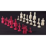 CHINESE TURNED BONE CHESS SET, late 19th century, natural and red stained, height of king 9cm;