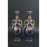 PAIR OF CROWN DERBY VASES a large pair of vases with gilded floral decoration on a rich blue ground.