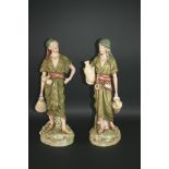 PAIR OF ROYAL DUX FIGURES a large pair of figures of Water Carriers, each painted in typical Royal