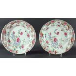 SET OF SIX CHINESE FAMILLE ROSE PLATES, late 18th century, decorated with flowers and rocks on a