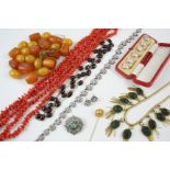 A QUANTITY OF JEWELLERY including a paste set necklace, formed as flower heads, and a pair of