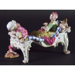 RUSSIAN BISQUE PORCELAIN BEDROOM GROUP, late 19th century, a couple taking breakfast in bed, a child