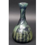 GALLE CAMEO VASE with a bulbous body and narrow neck, with a raised design of flowers on a green