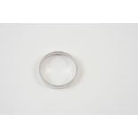 A 9CT. WHITE GOLD WEDDING BAND 2.9 grams. Size T.