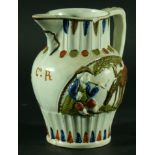 PRATTWARE JUG c. 1800, moulded with a toper and horse, the reverse with a toper and bottle of