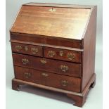 QUEEN ANNE OAK BUREAU, the fall front enclosing a fitted interior with well, height 107cm, width