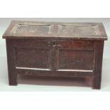 OAK COFFER, late 17th or early 18th century, with plain double panelled pin hinged top and front,