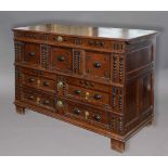 JACOBEAN STYLE OAK DOWRY CHEST, possibly American, the hinged cover enclosing a candlebox
