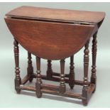 WALNUT GATELEG OCCASIONAL TABLE, 18th century, the oval top above a single drawer on turned legs,