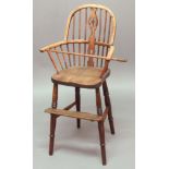 WINDSOR CHILD'S HIGH CHAIR, 19th century, with wheel back and correction bar, height 93cm