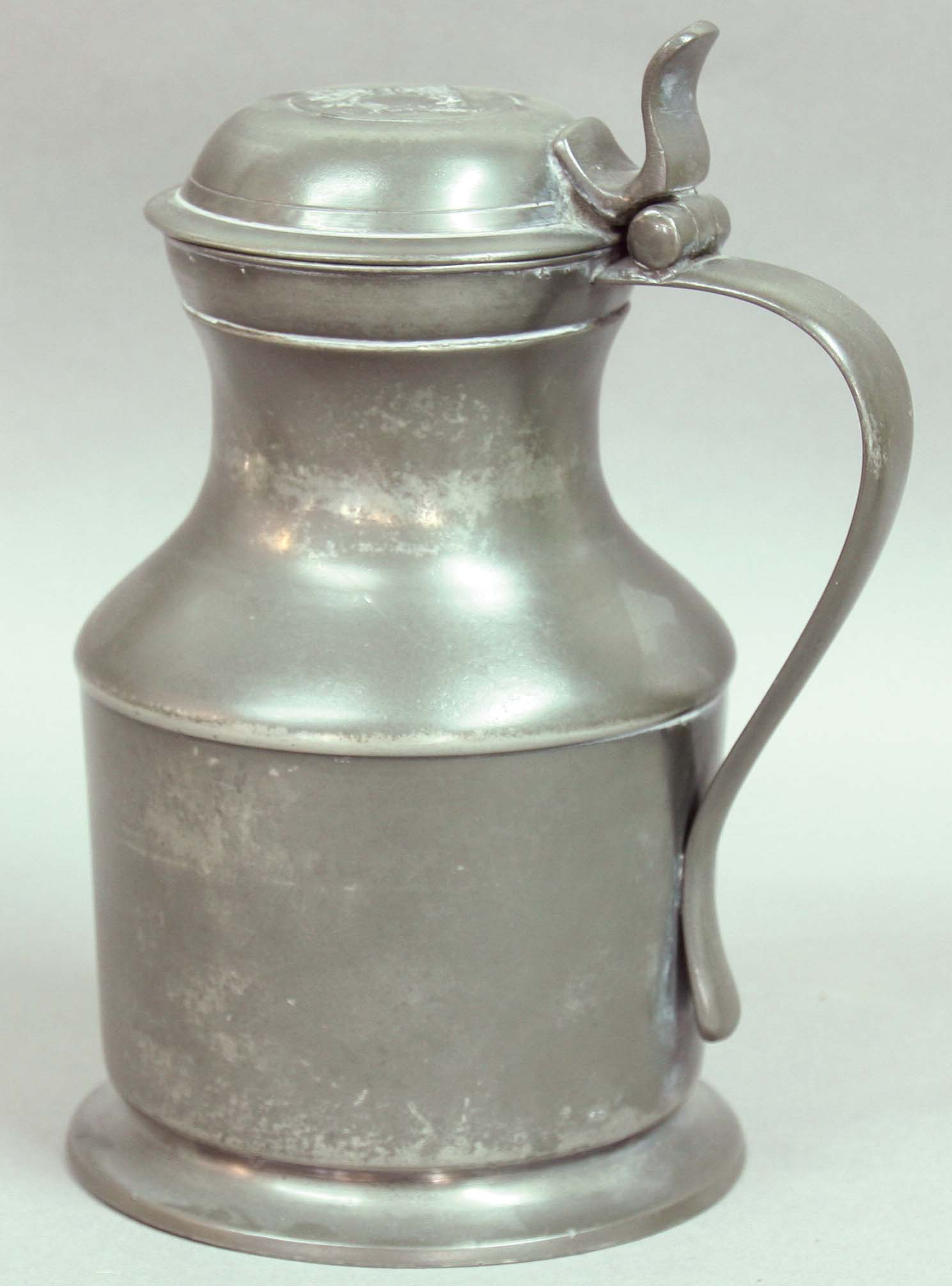 PEWTER TAPPIT HEN, the domed cover with scrolling thumb piece, London touchmarks, 22.5cm